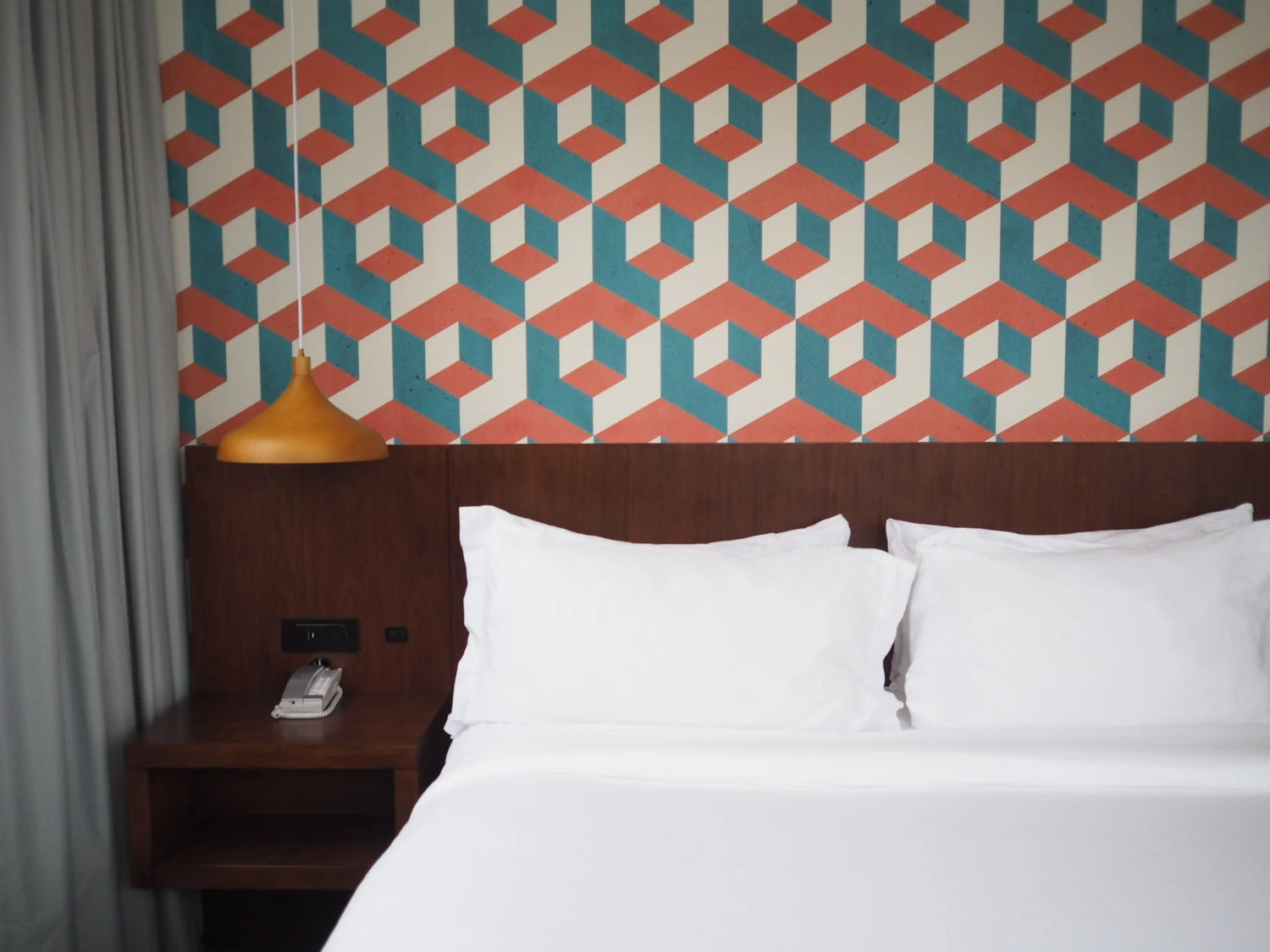 Trendy patterned wallpaper in a stylish room completed by Southside Paint